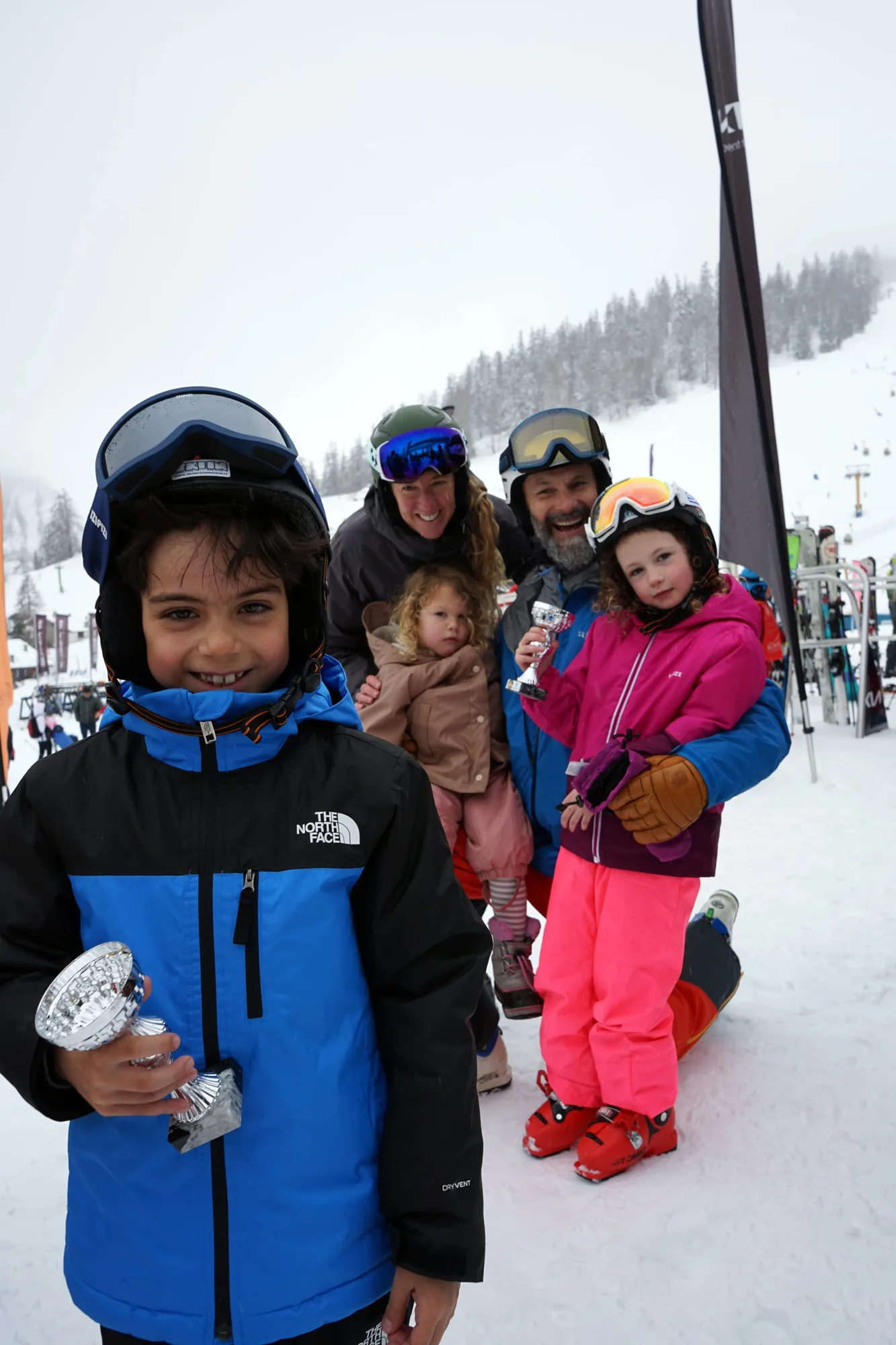 Children and adults together on the snow on an Archie's family ski week